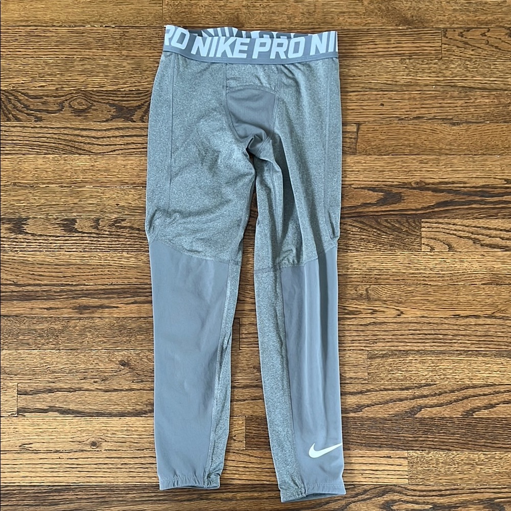 Nike DRI FIT PRO Gray Leggings with Stretchy Fit and Full-Length Design